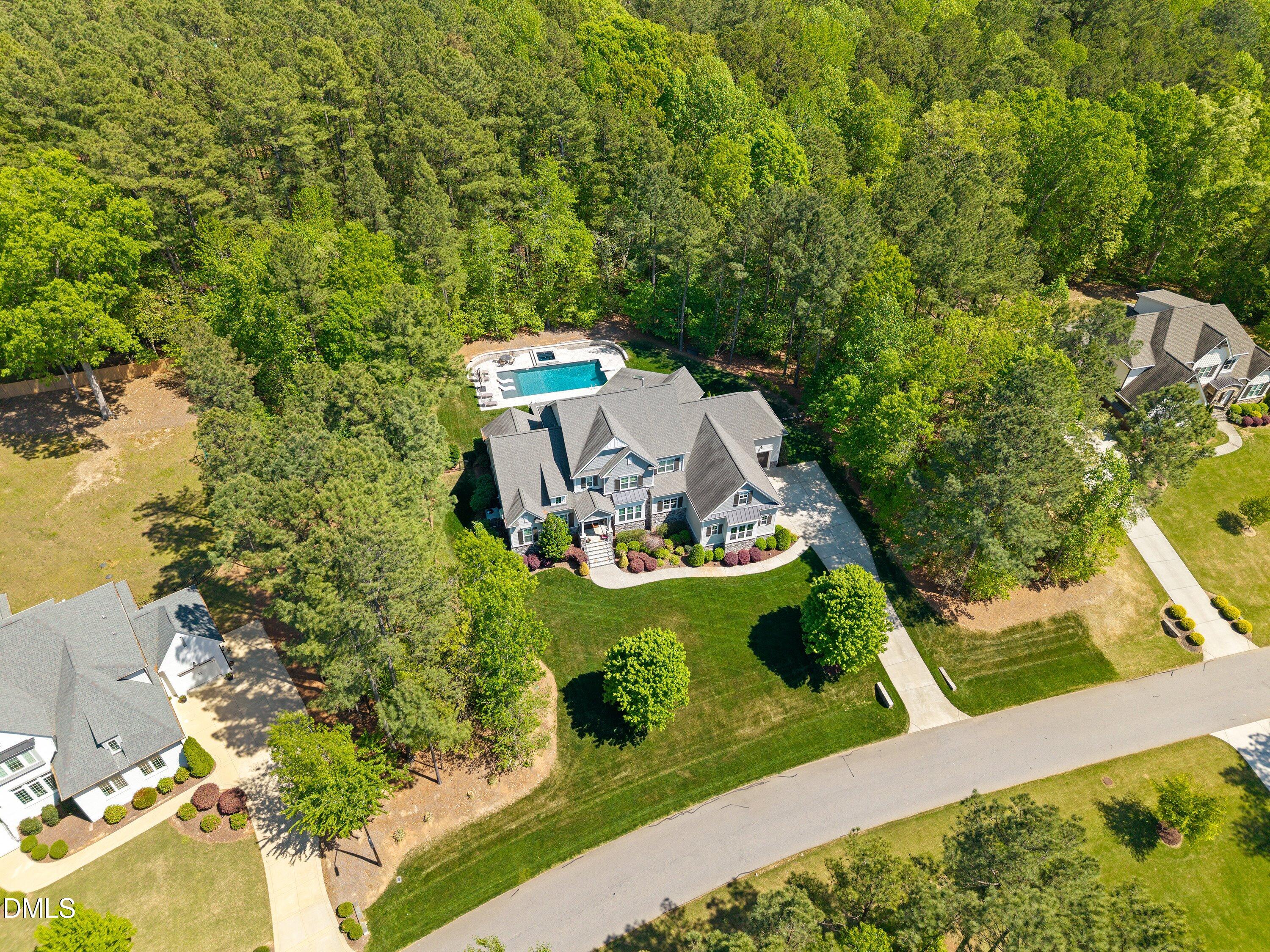 1536 Rock Dove Way Raleigh, NC 27614 - Photo 98 of 100 an aerial view of a house with yard swimming pool and outdoor seating