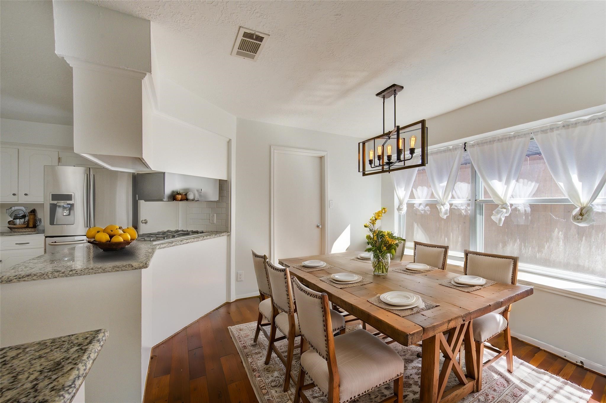 29115 Raestone Street Spring, TX 77386 - Photo 11 of 40 a view of a dining room with furniture and a table