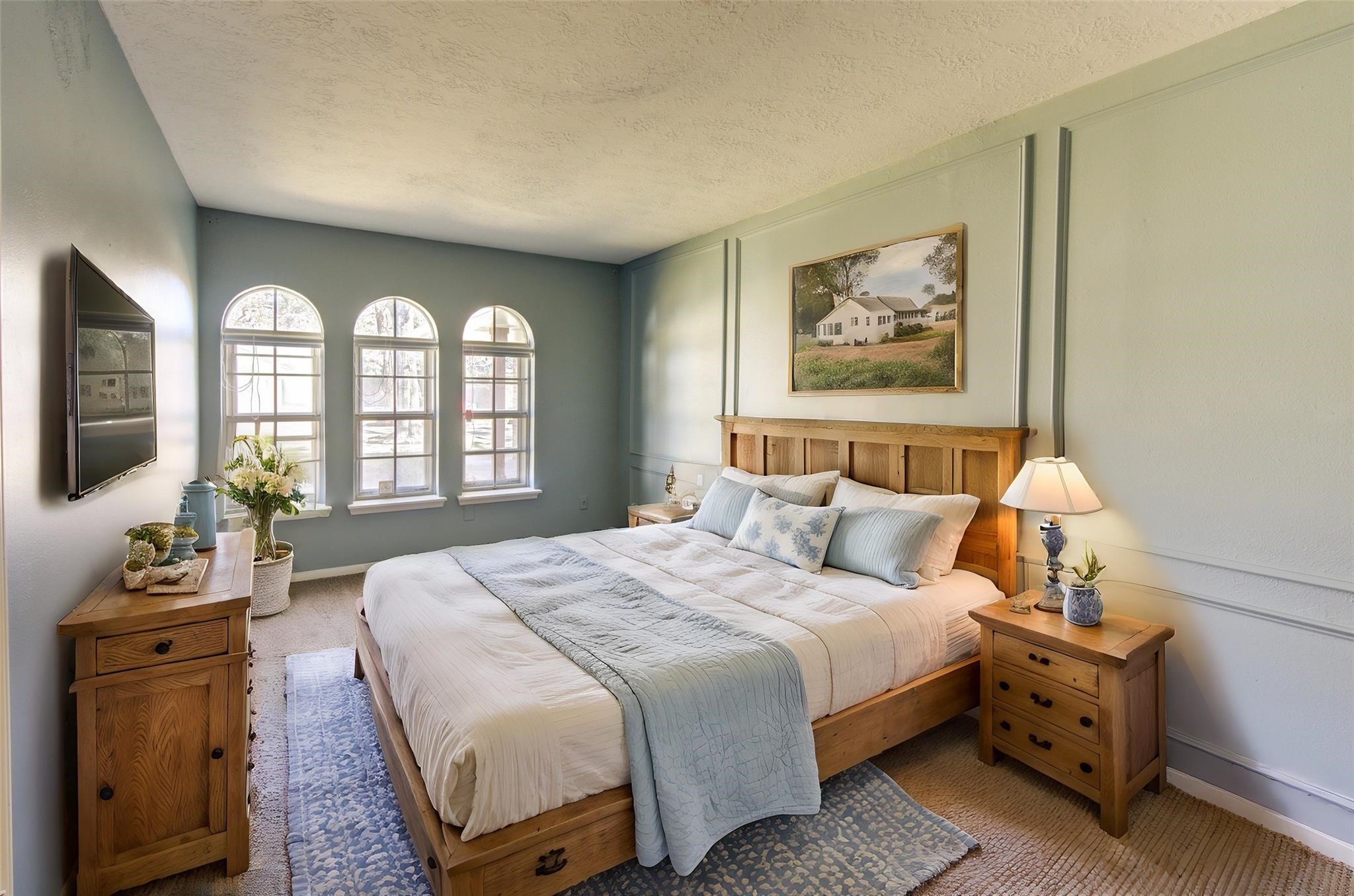 29115 Raestone Street Spring, TX 77386 - Photo 27 of 40 a bedroom with a bed and a large window