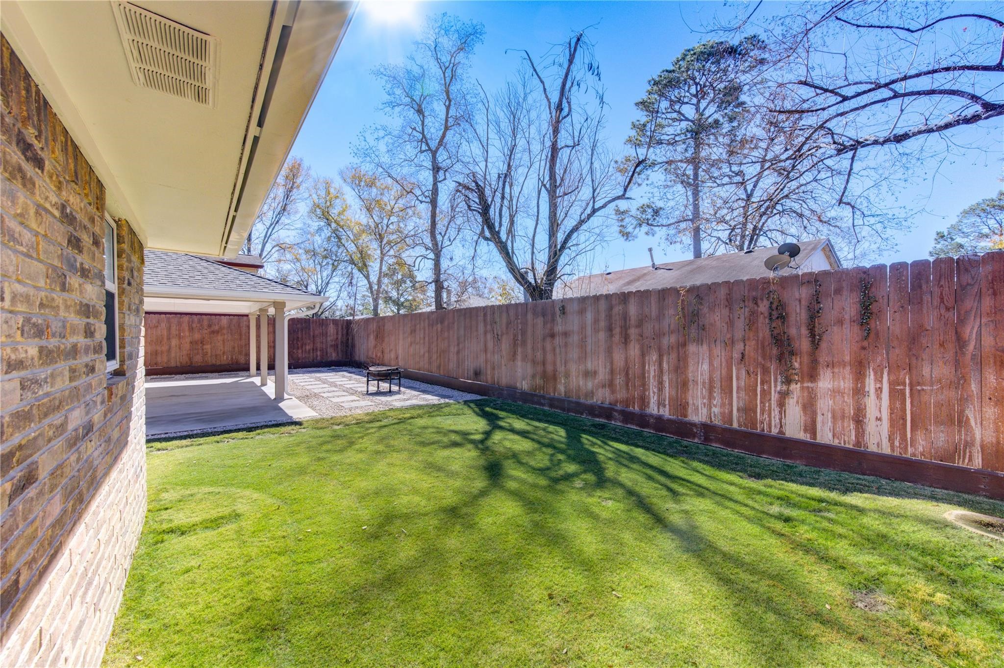 29115 Raestone Street Spring, TX 77386 - Photo 38 of 40 a view of a backyard with a small cabin