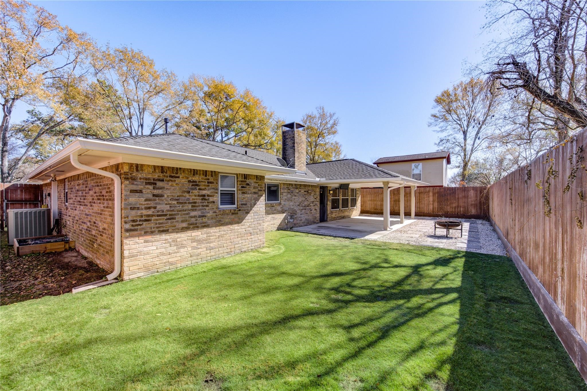 29115 Raestone Street Spring, TX 77386 - Photo 39 of 40 a view of a house with a yard