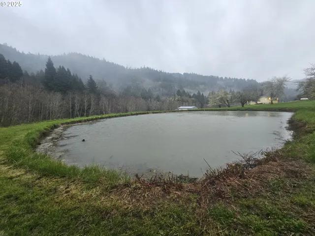 a view of lake with mountain