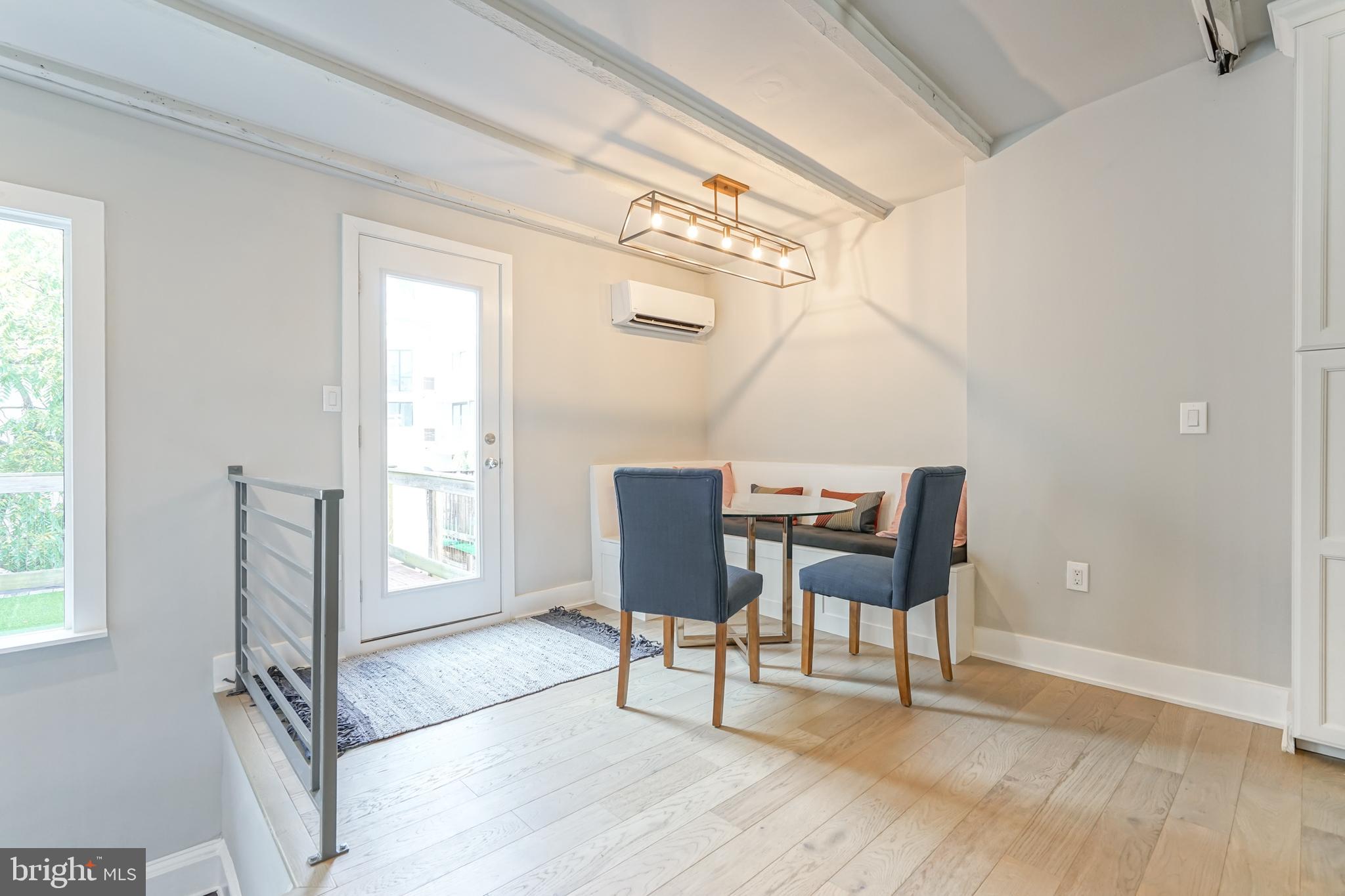 2314 South Street Philadelphia, PA 19146 - Photo 26 of 83 a workspace with wooden floor and a window