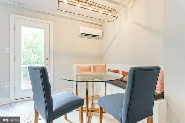 a bathroom with a double vanity sink mirror and a shower