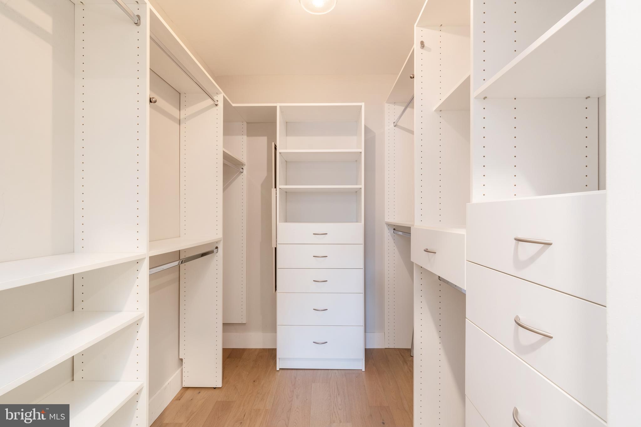 2314 South Street Philadelphia, PA 19146 - Photo 38 of 83 a view of walk in closet with empty racks