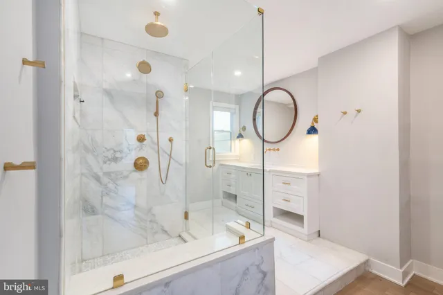a view of storage and utility room with washer and dryer