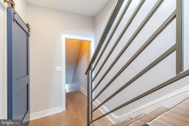 a view of a large building with a yard