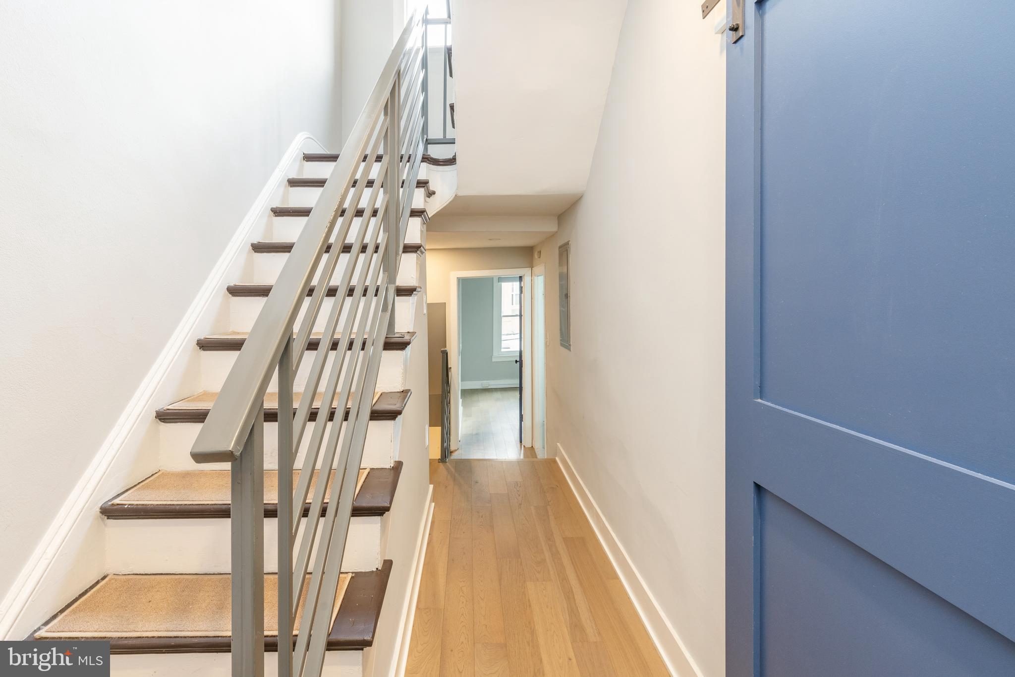 2314 South Street Philadelphia, PA 19146 - Photo 51 of 83 a view of staircase with white walls and a window