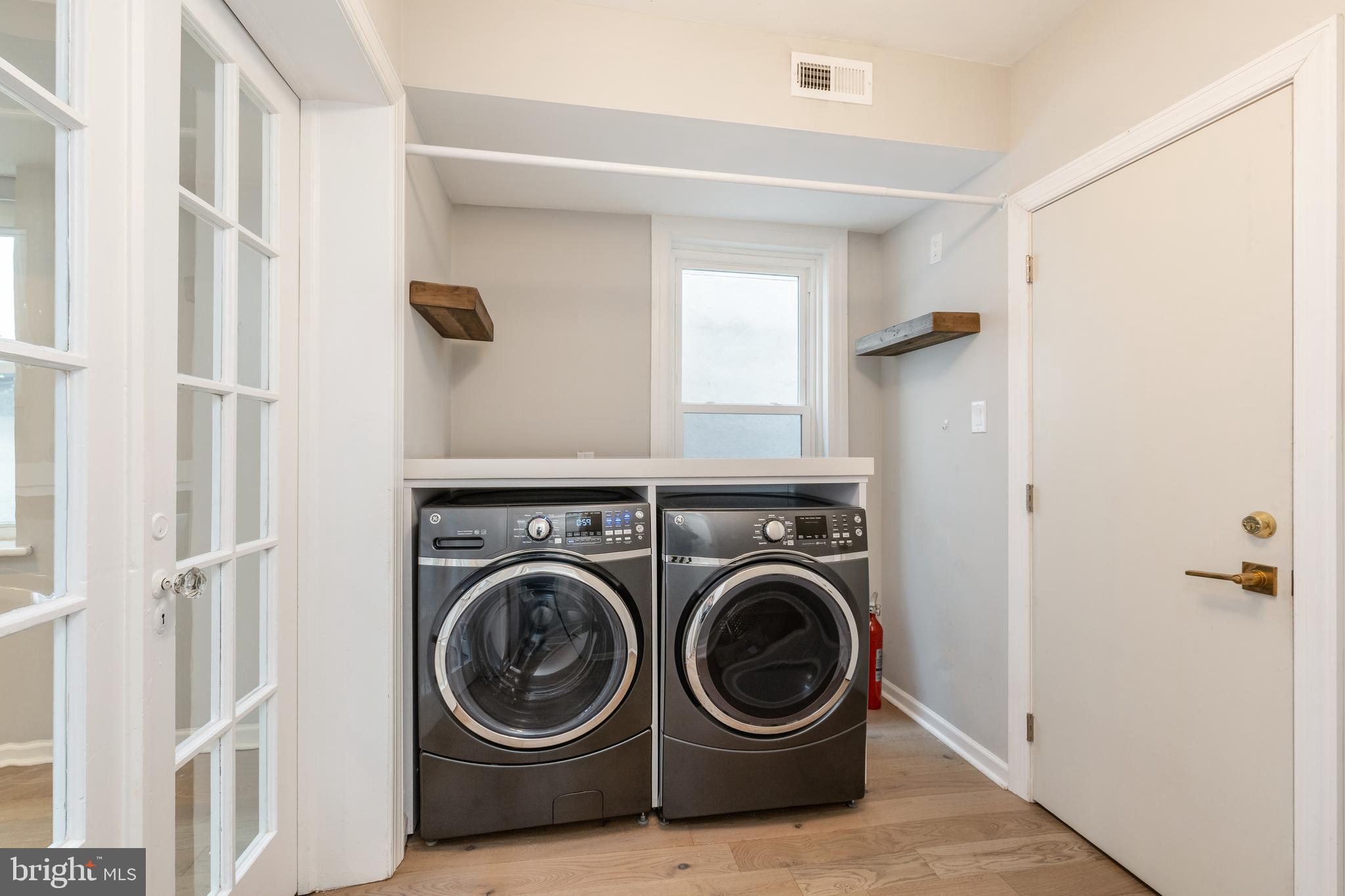 2314 South Street Philadelphia, PA 19146 - Photo 65 of 83 a view of storage and utility room with washer and dryer