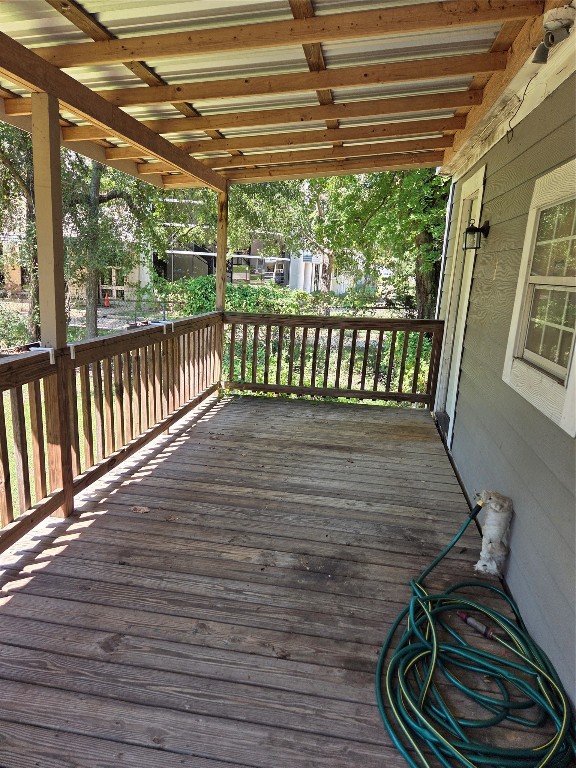 417 West Lewis Street Conroe, TX 77301 - Photo 10 of 11 a view of a porch with wooden floor