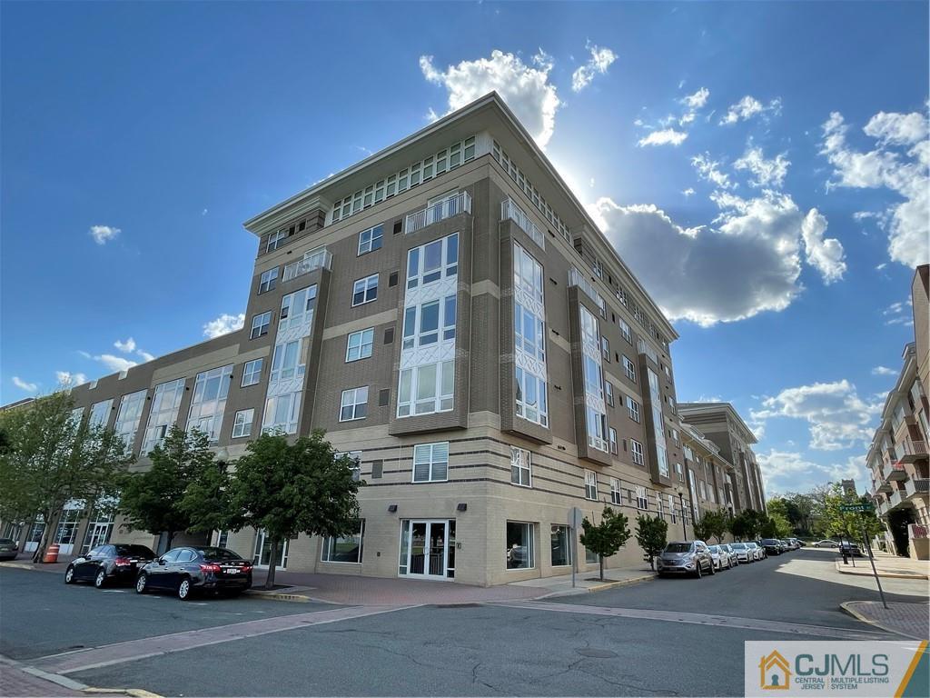 358 Rector Street, Unit 219 Perth Amboy, NJ 08861 - Photo 1 of 17 a view of a building and a street