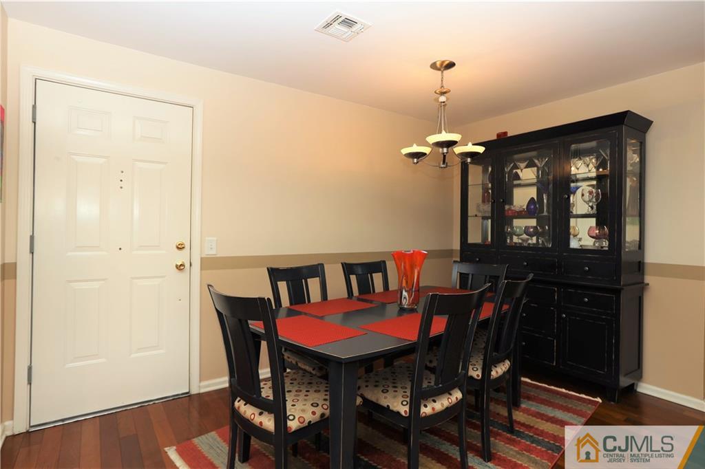 358 Rector Street, Unit 219 Perth Amboy, NJ 08861 - Photo 8 of 17 a view of a dining room with furniture and window