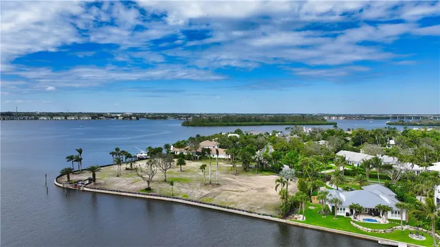 a view of a lake with a yard