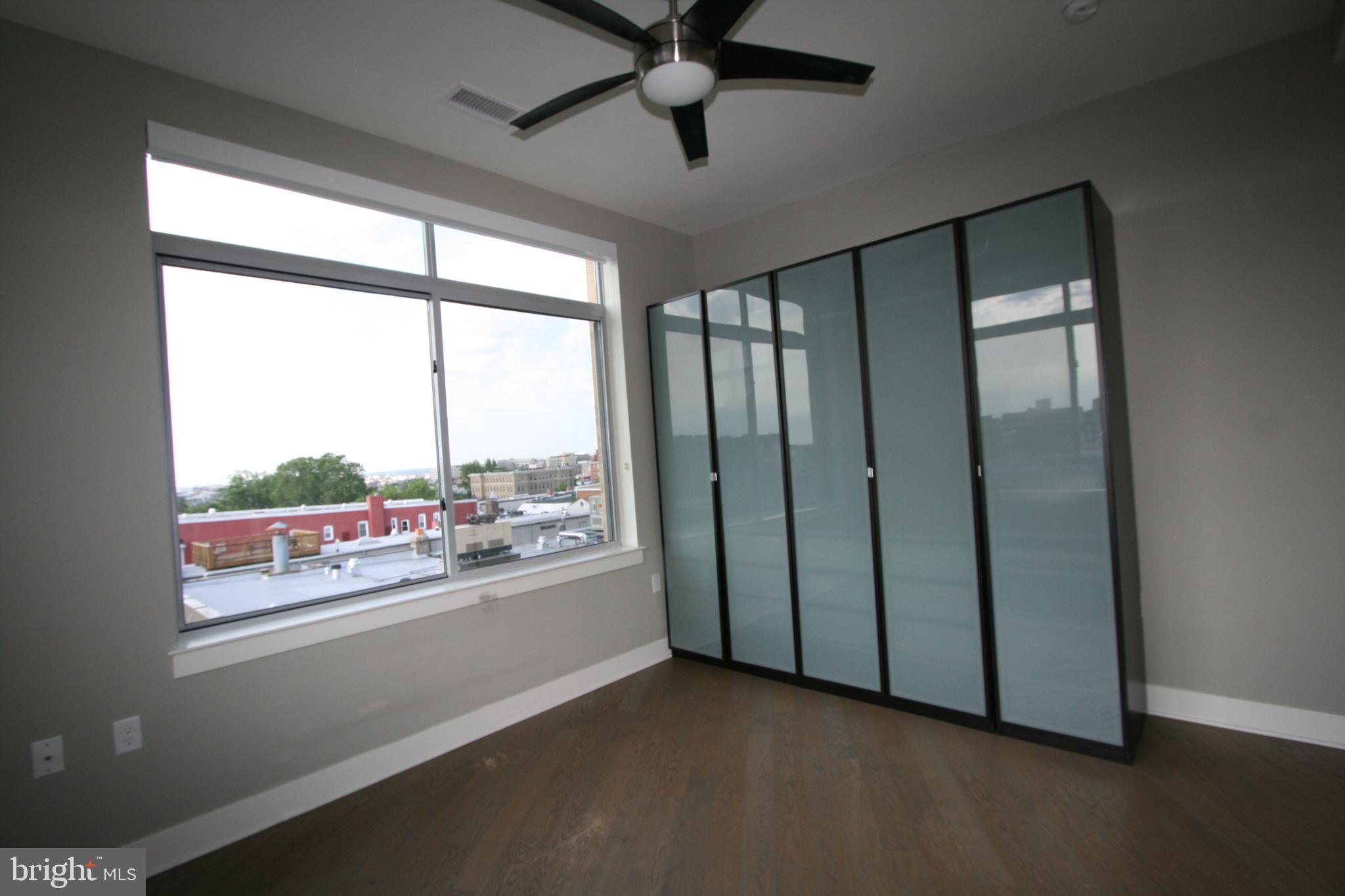 2550 17th Street Northwest, Unit 612 Washington, DC 20009 - Photo 18 of 55 a view of an empty room with a window