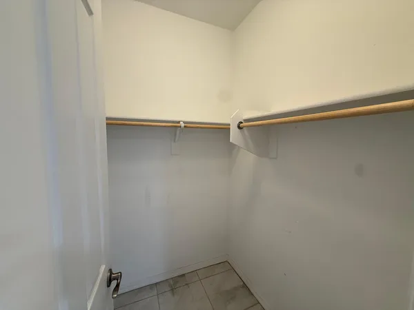 a bathroom with a sink toilet and mirror