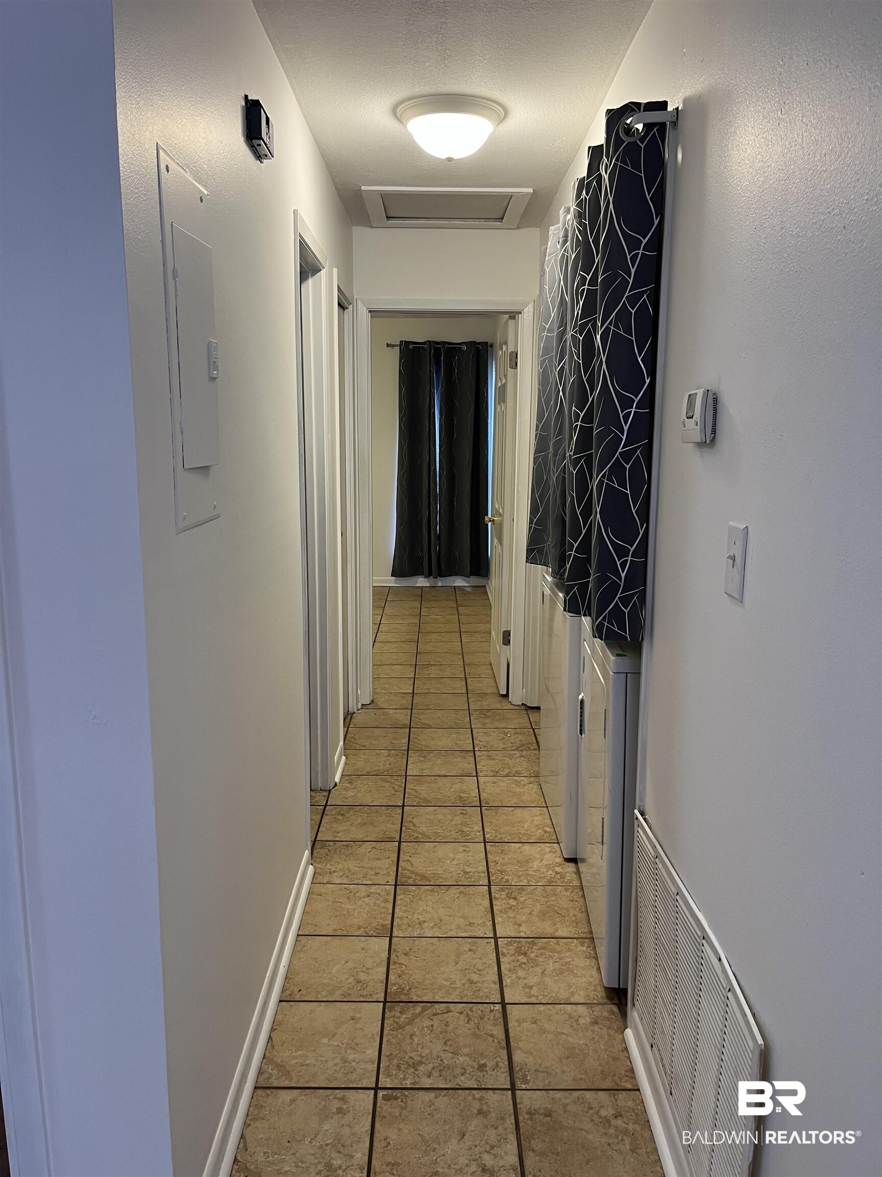 1146 North Alston Street Foley, AL 36535 - Photo 12 of 20 Corridor featuring attic access and washer / clothes dryer