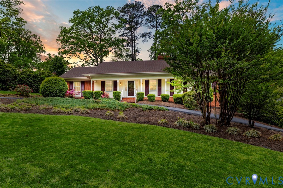 3140 Archdale Road Richmond, VA 23235 - Photo 1 of 48 a front view of a house with a yard