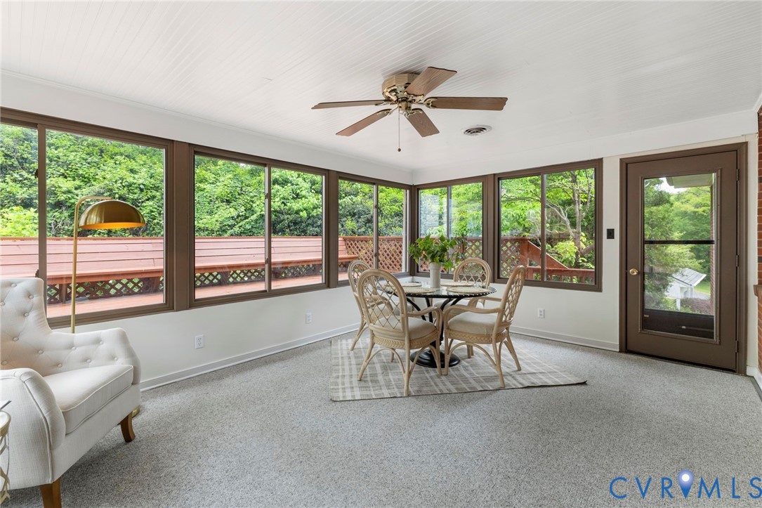 3140 Archdale Road Richmond, VA 23235 - Photo 20 of 48 a dining room with furniture window and outside view