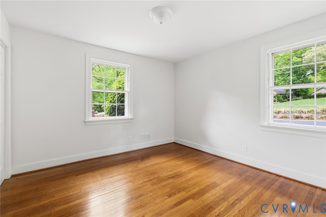 3140 Archdale Road Richmond, VA 23235 - Photo 26 of 48 a view of a room with wooden floor and a window