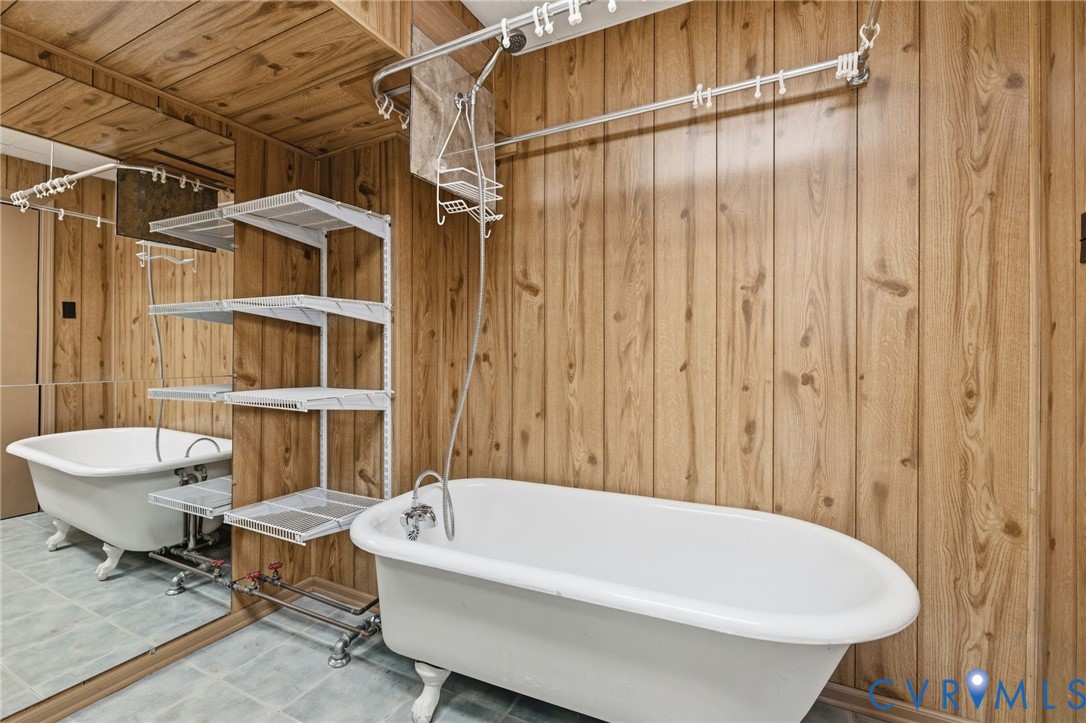 3140 Archdale Road Richmond, VA 23235 - Photo 31 of 48 a bathroom with a white tub shower and toilet