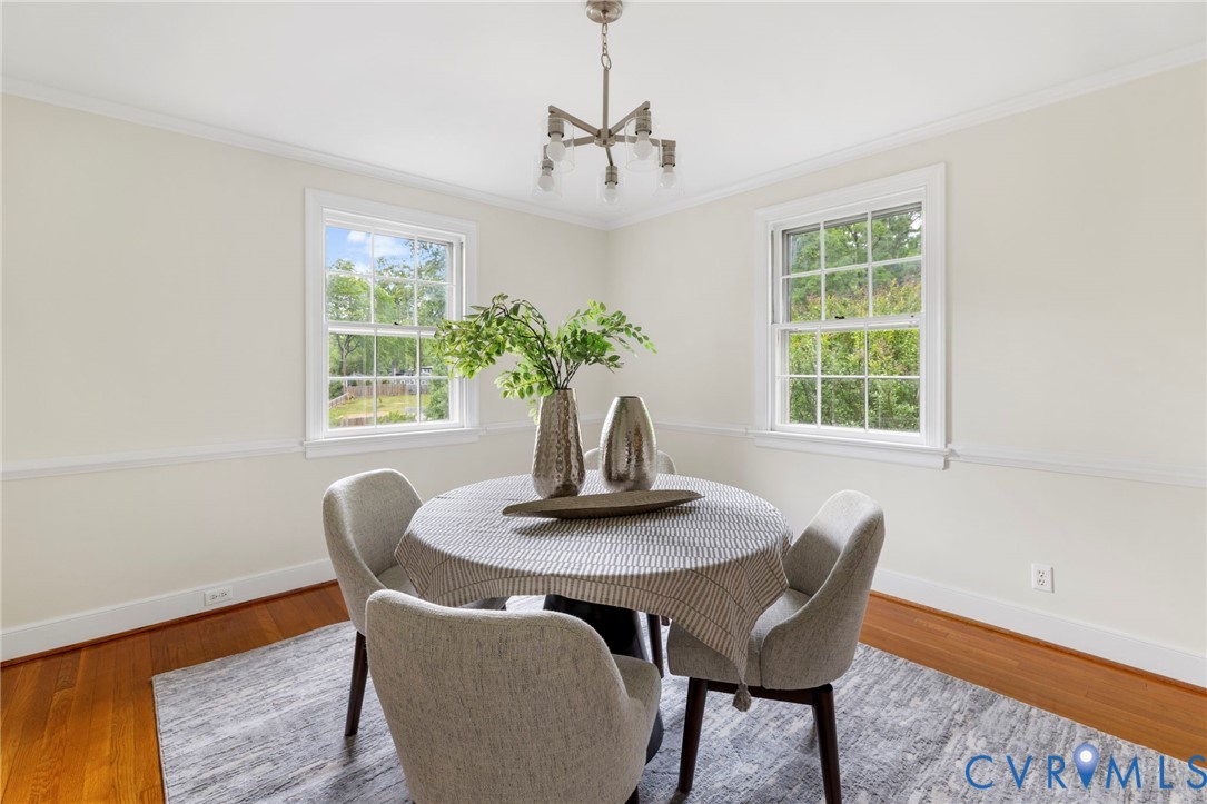 3140 Archdale Road Richmond, VA 23235 - Photo 10 of 48 a view of a dining room with furniture window and outside view