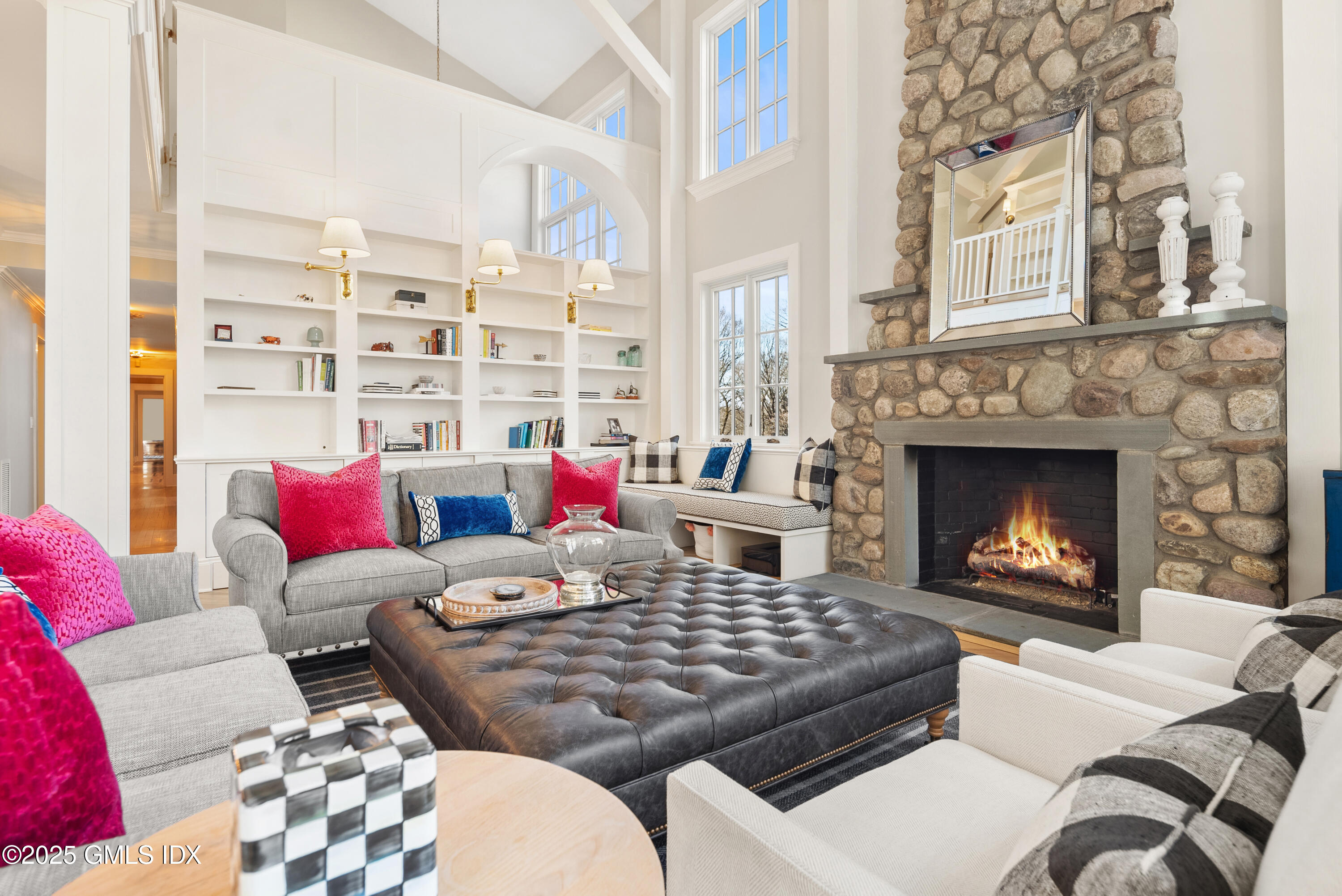 70 Sumner Road Greenwich, CT 06831 - Photo 12 of 57 a living room with furniture and a fireplace