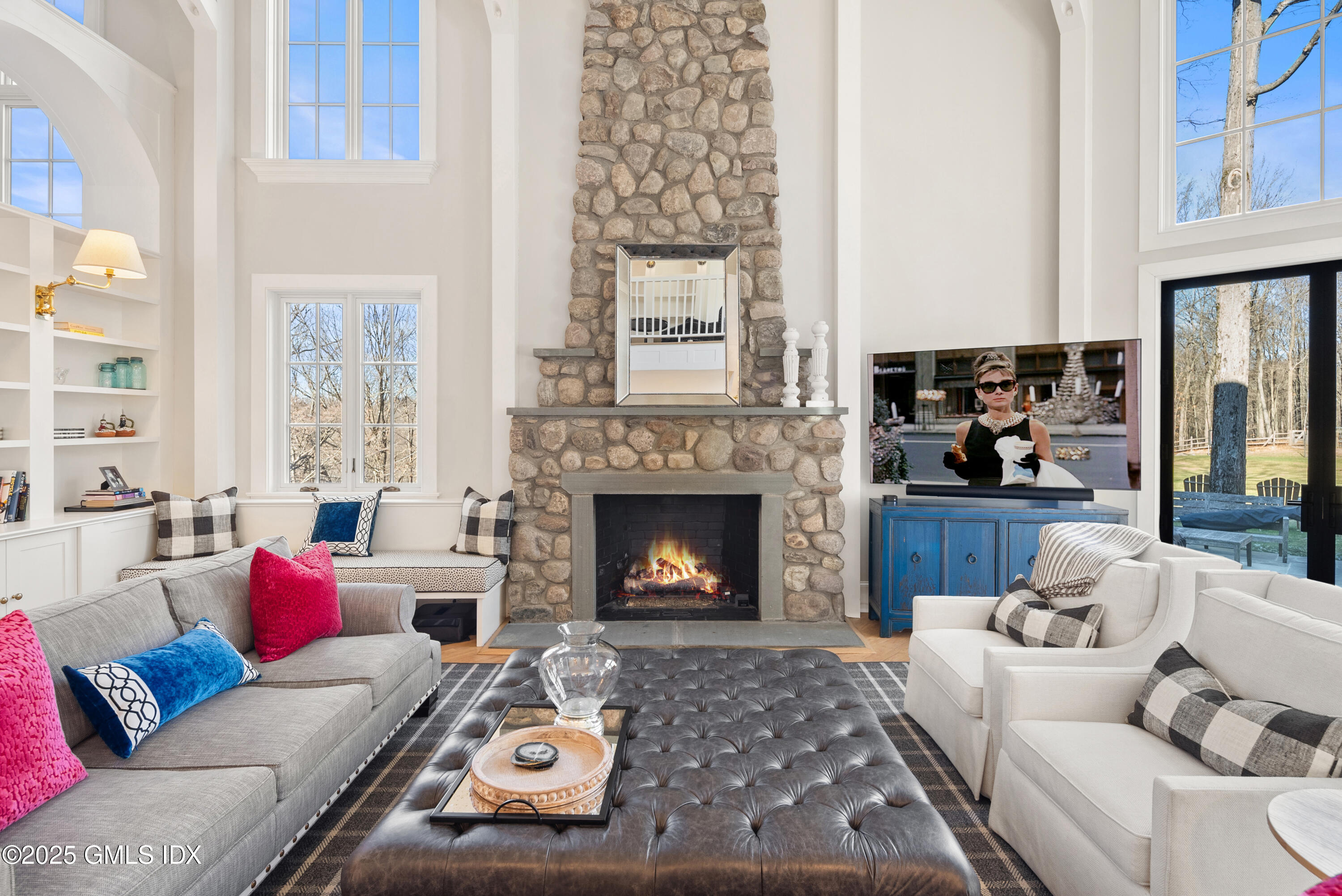 70 Sumner Road Greenwich, CT 06831 - Photo 13 of 57 a living room with furniture and a fireplace