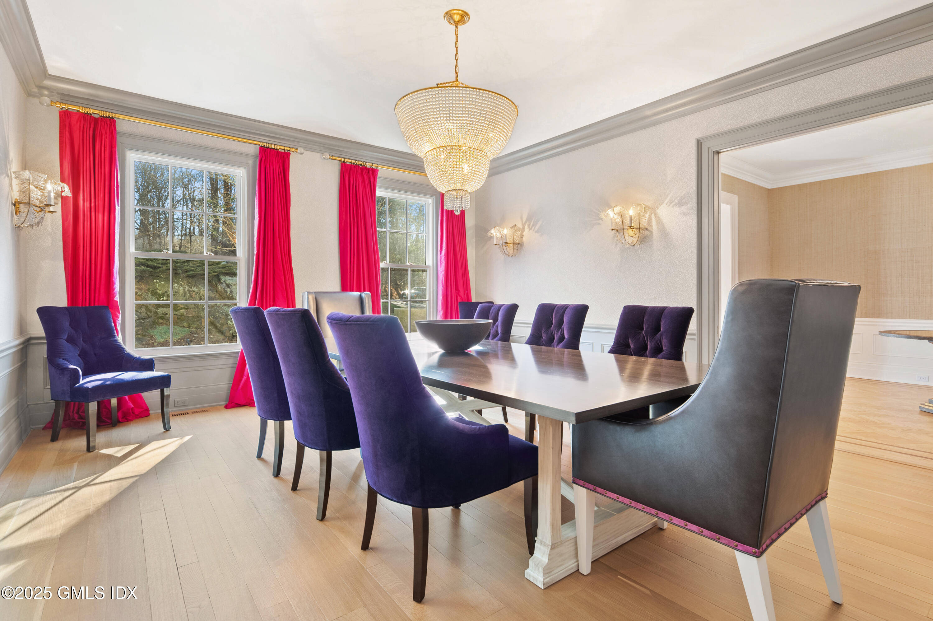 70 Sumner Road Greenwich, CT 06831 - Photo 26 of 57 a view of a dining room with furniture and a large window
