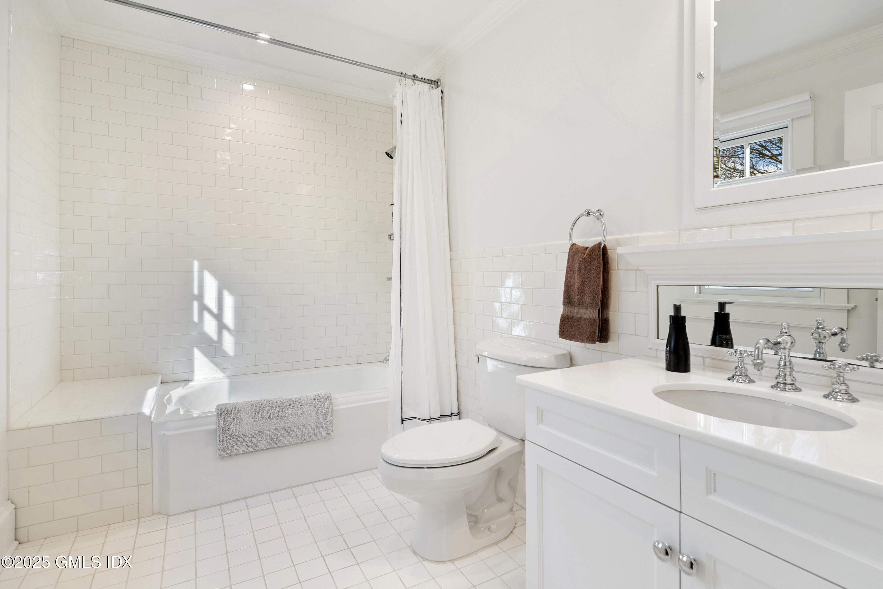 70 Sumner Road Greenwich, CT 06831 - Photo 38 of 57 a bathroom with a sink toilet and shower