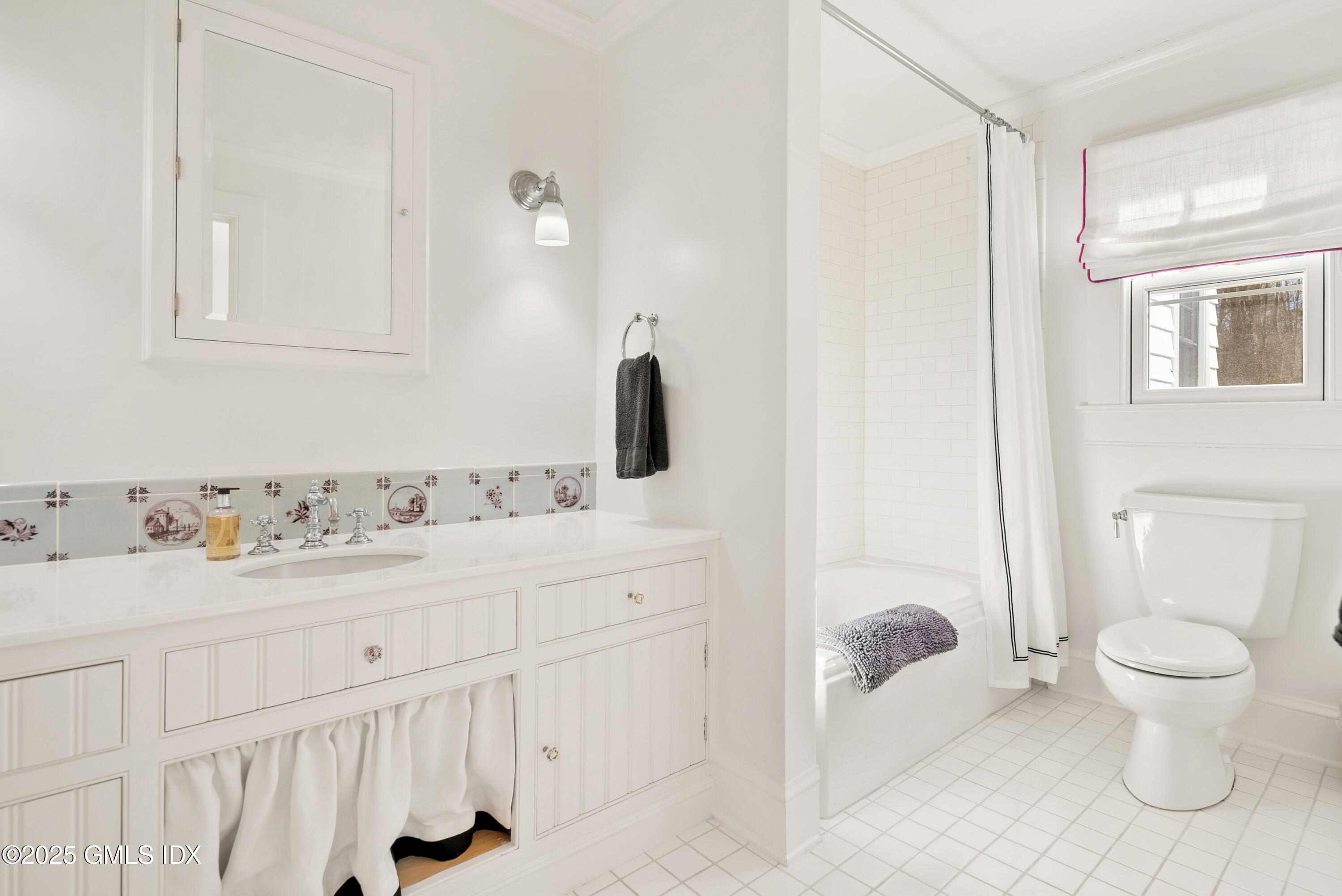 70 Sumner Road Greenwich, CT 06831 - Photo 43 of 57 a bathroom with a sink toilet and a mirror