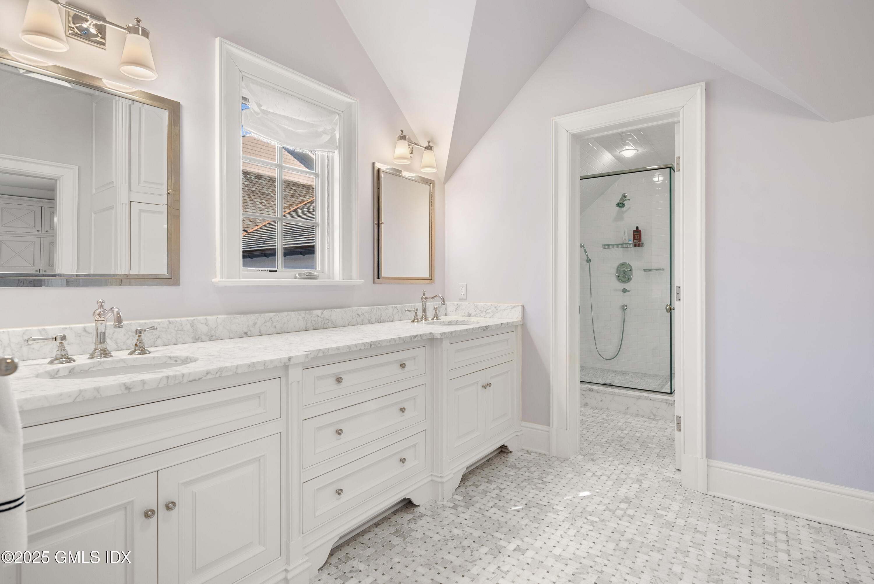 70 Sumner Road Greenwich, CT 06831 - Photo 46 of 57 a spacious bathroom with 2 sink shower and a mirror