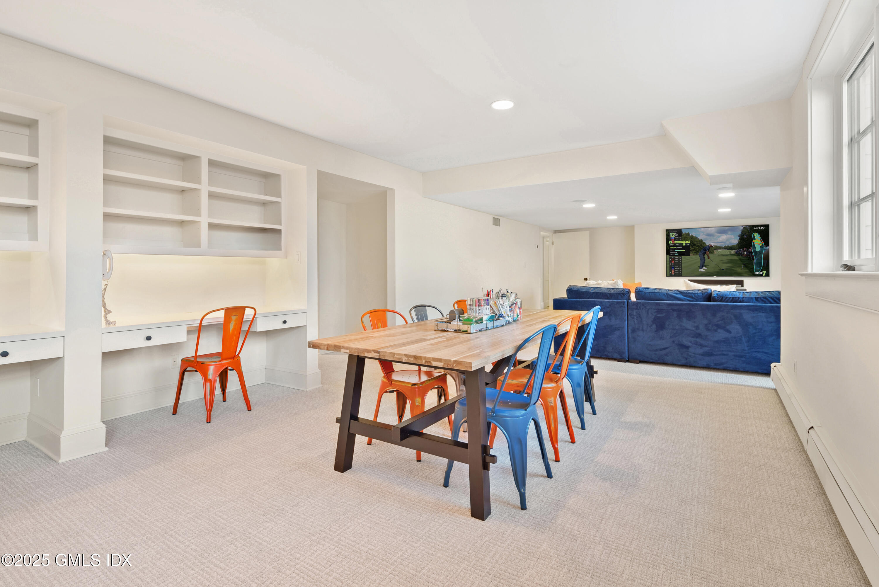 70 Sumner Road Greenwich, CT 06831 - Photo 51 of 57 a dining room with a table and chairs