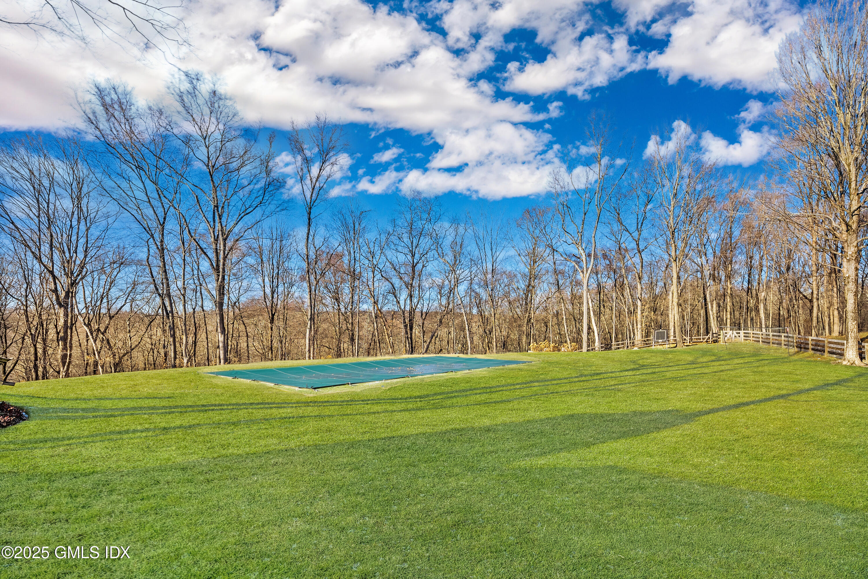 70 Sumner Road Greenwich, CT 06831 - Photo 7 of 57 a big yard with lots of trees