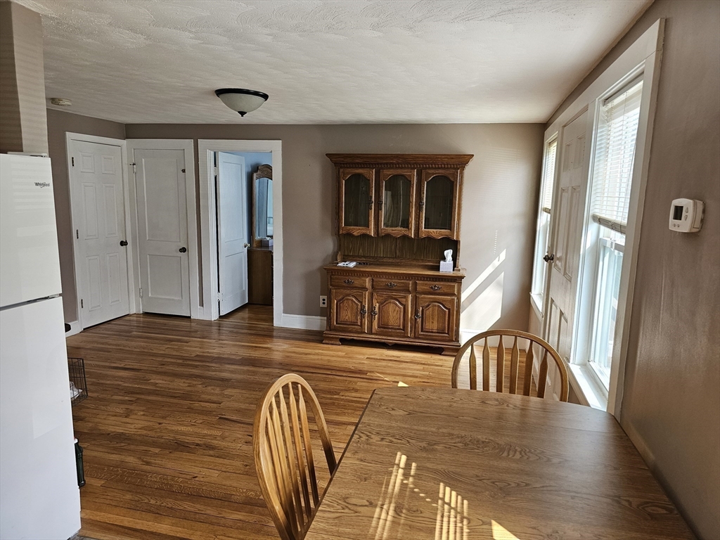 30 Donlon Street Framingham, MA 01701 - Photo 6 of 17 a view of living room with furniture and wooden floor