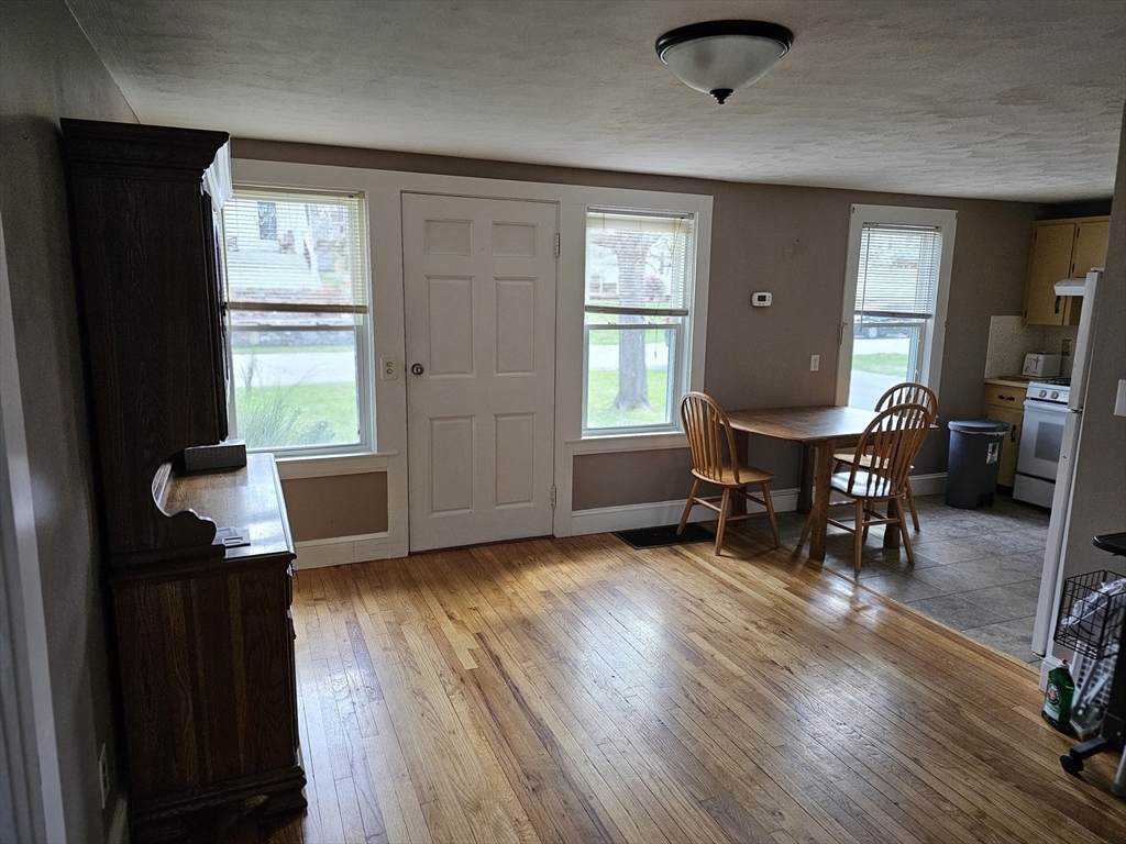 30 Donlon Street Framingham, MA 01701 - Photo 7 of 17 a view of a livingroom with furniture and hardwood floor