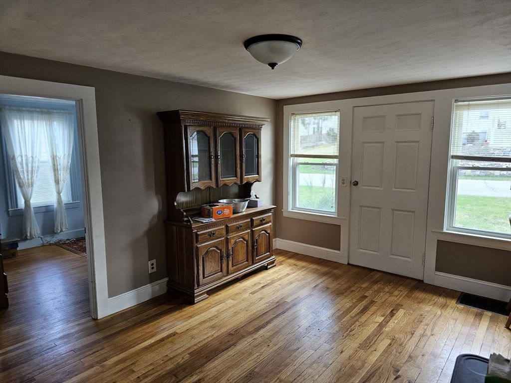 30 Donlon Street Framingham, MA 01701 - Photo 8 of 17 a room with window and wooden floor
