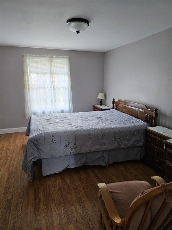 30 Donlon Street Framingham, MA 01701 - Photo 10 of 17 a bedroom with a bed and wooden floor