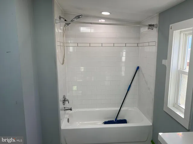a bathroom with a bathtub