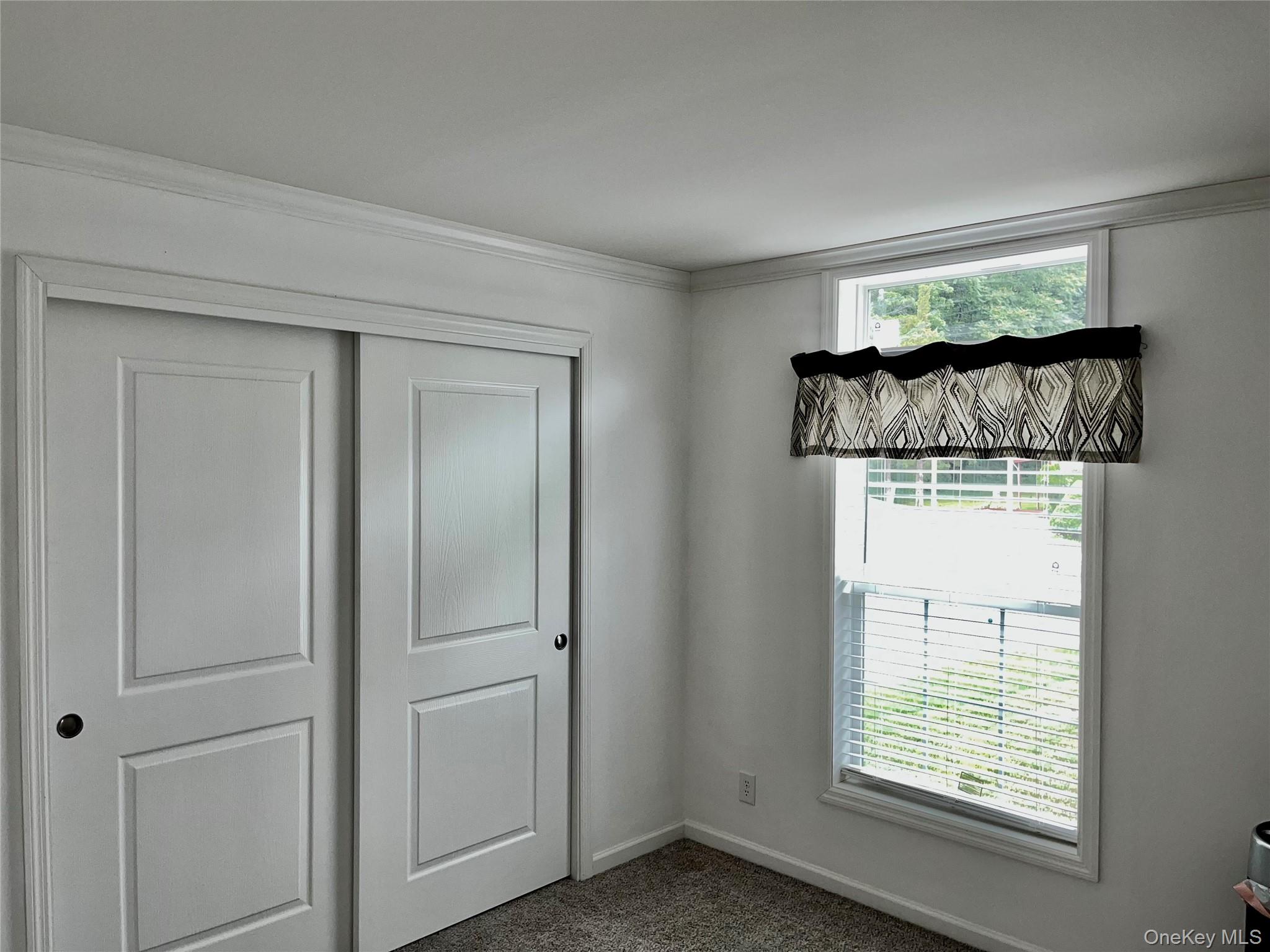 509 5th Avenue Middletown, NY 10941 - Photo 12 of 19 a walk in closet room with a window