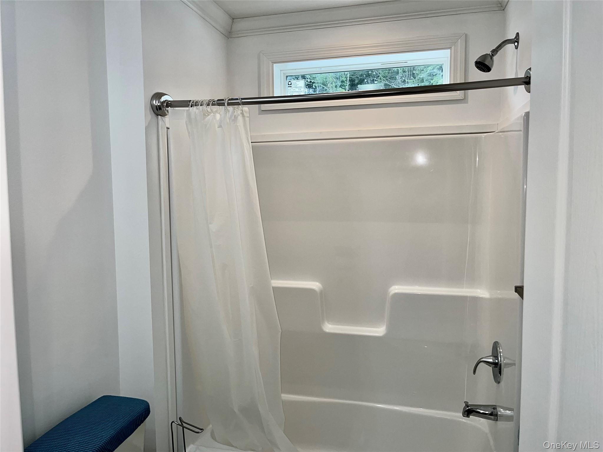 509 5th Avenue Middletown, NY 10941 - Photo 14 of 19 a bathroom with a shower and a bath tub