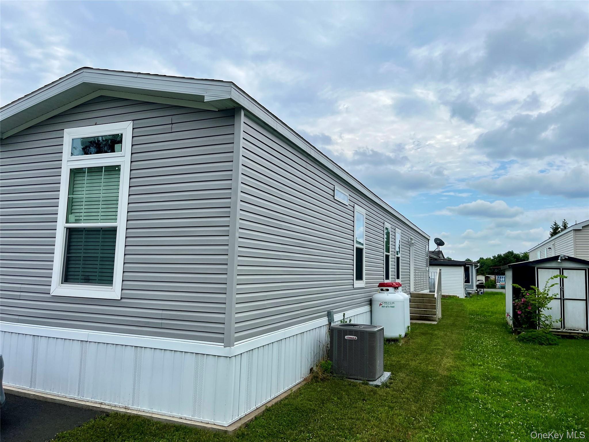 509 5th Avenue Middletown, NY 10941 - Photo 17 of 19 a front view of a house with a yard