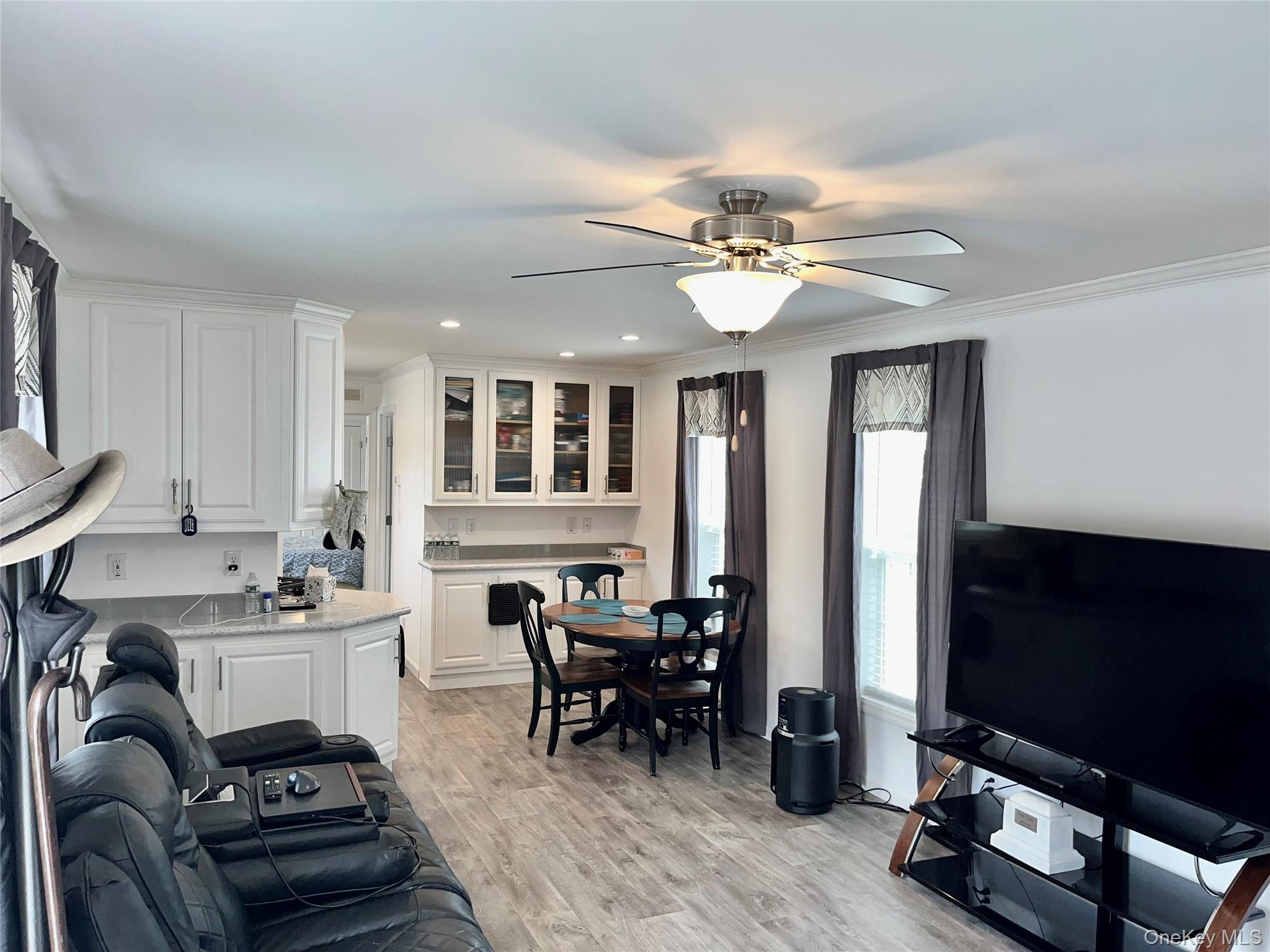 509 5th Avenue Middletown, NY 10941 - Photo 2 of 19 a living room with furniture a flat screen tv and dresser