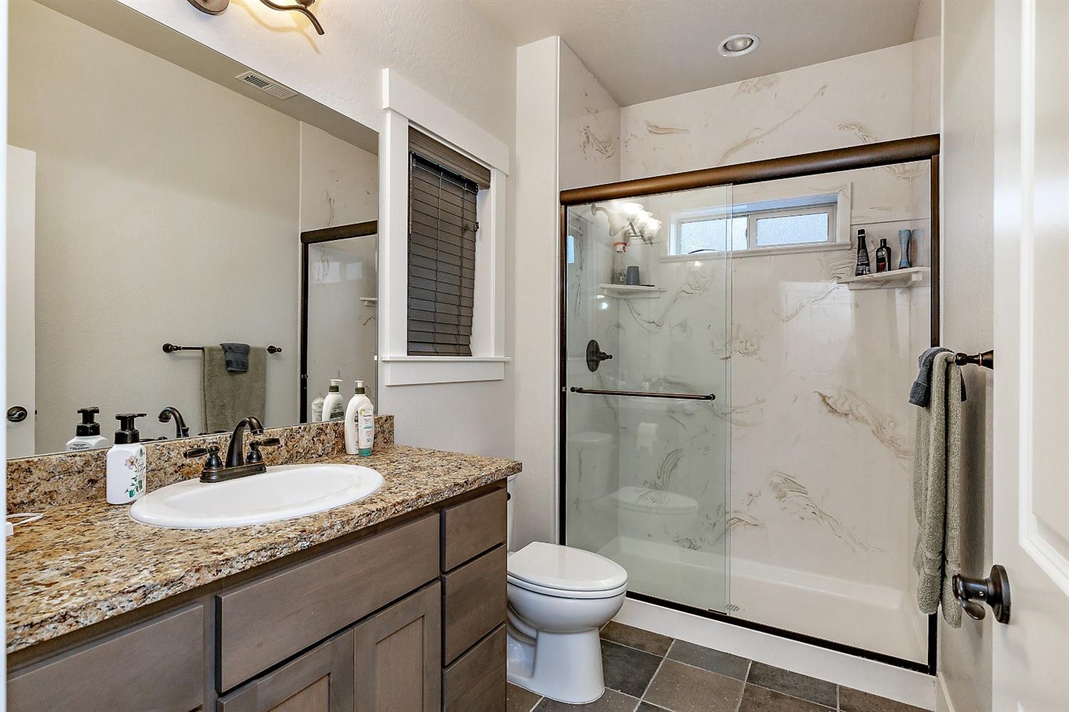 1100 Andrews Road Jacksonville, OR 97530 - Photo 18 of 24 Master bathroom has a granite counter to