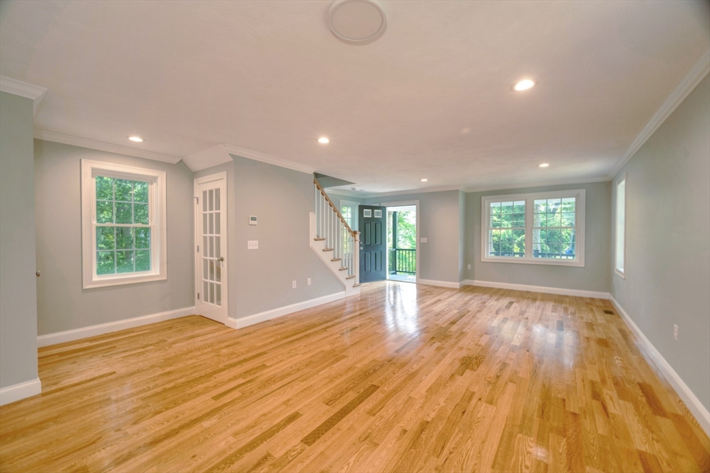 21 Valley Road Holbrook, MA 02343 - Photo 11 of 19 a view of an empty room with wooden floor and a window