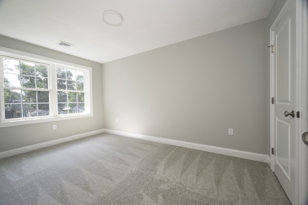21 Valley Road Holbrook, MA 02343 - Photo 17 of 19 an empty room with windows and closet