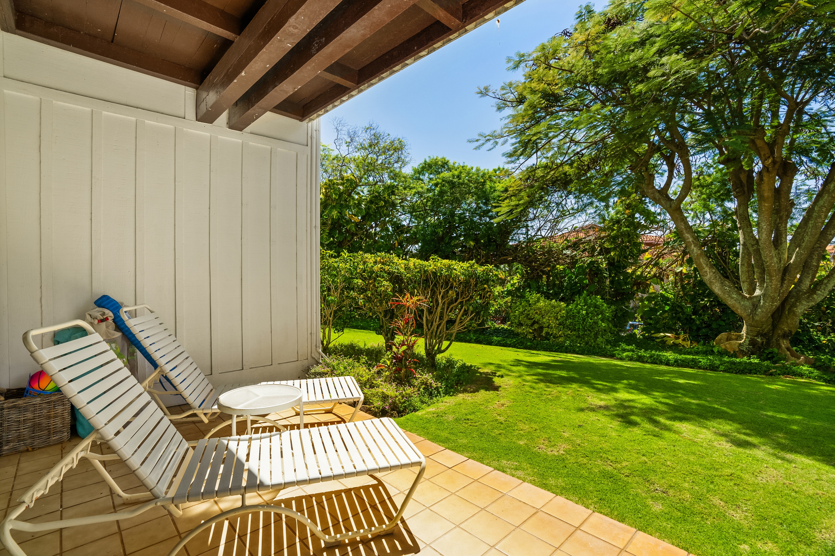 2253 Poipu Road, Unit 402 Koloa, HI 96756 - Photo 15 of 16 a view of a backyard with sitting area