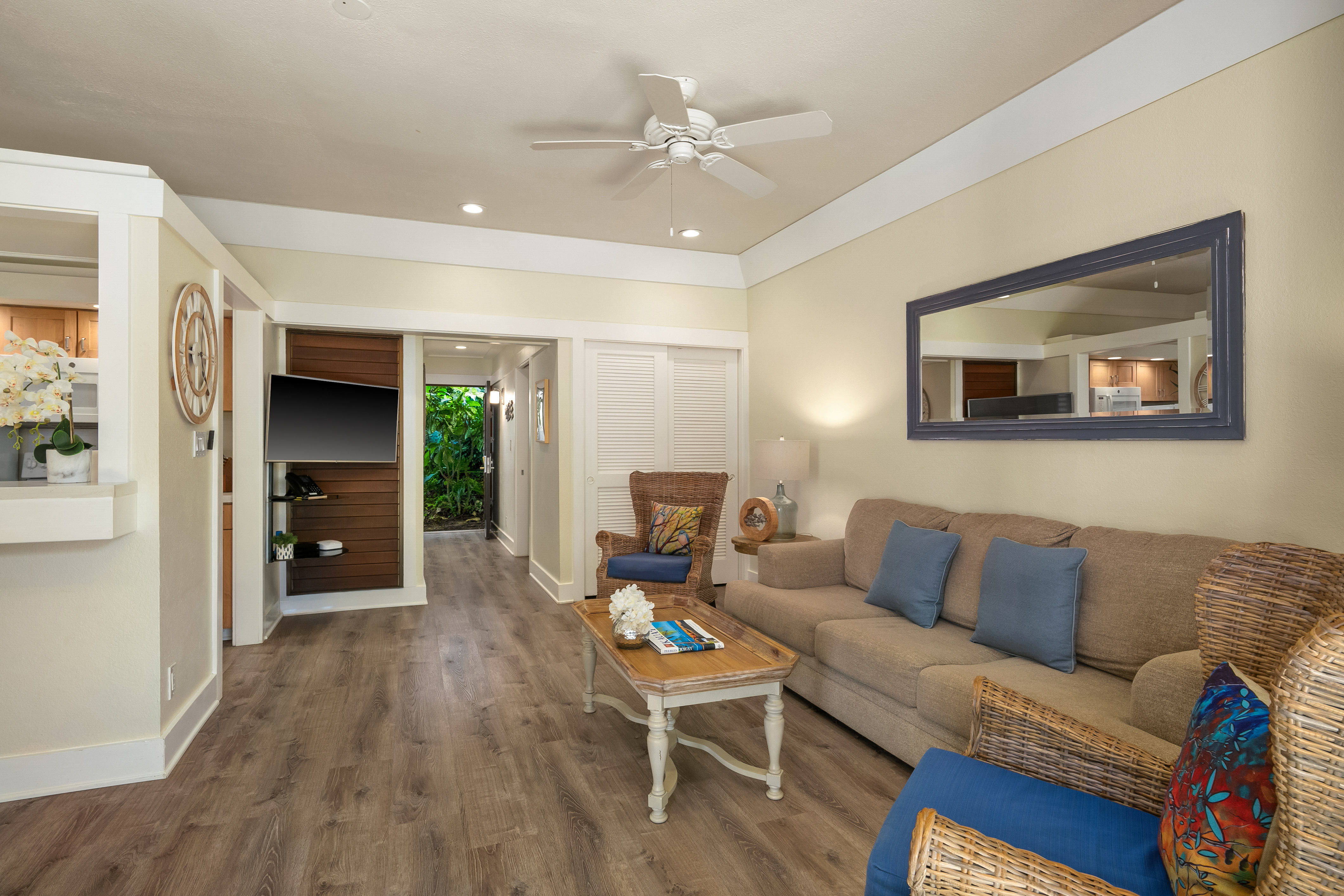 2253 Poipu Road, Unit 402 Koloa, HI 96756 - Photo 3 of 16 a living room with furniture and wooden floor