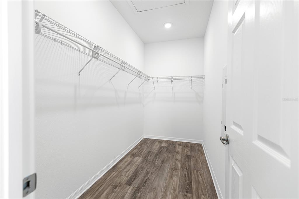 10242 Southwest 99th Lane Ocala, FL 34481 - Photo 27 of 51 a view of a room with wooden floor