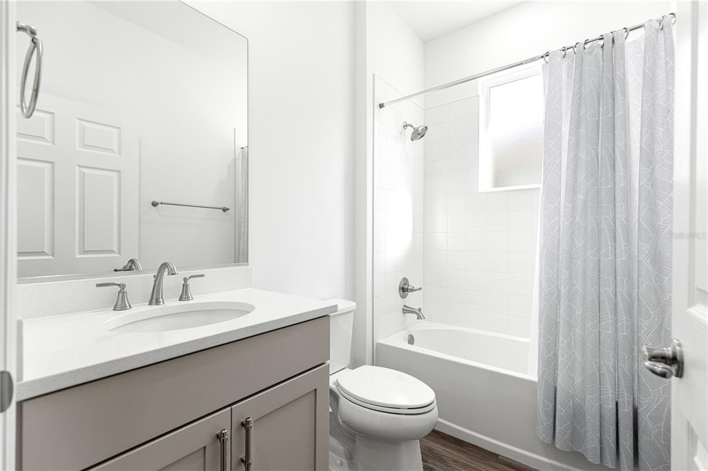 10242 Southwest 99th Lane Ocala, FL 34481 - Photo 34 of 51 a bathroom with a sink toilet and shower