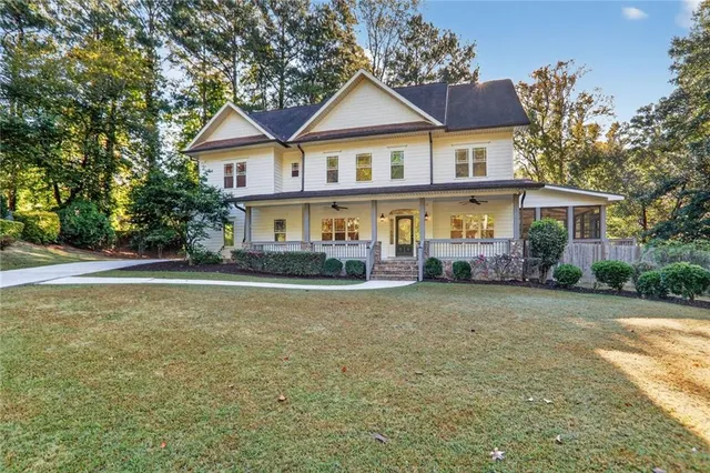 a front view of a house with yard